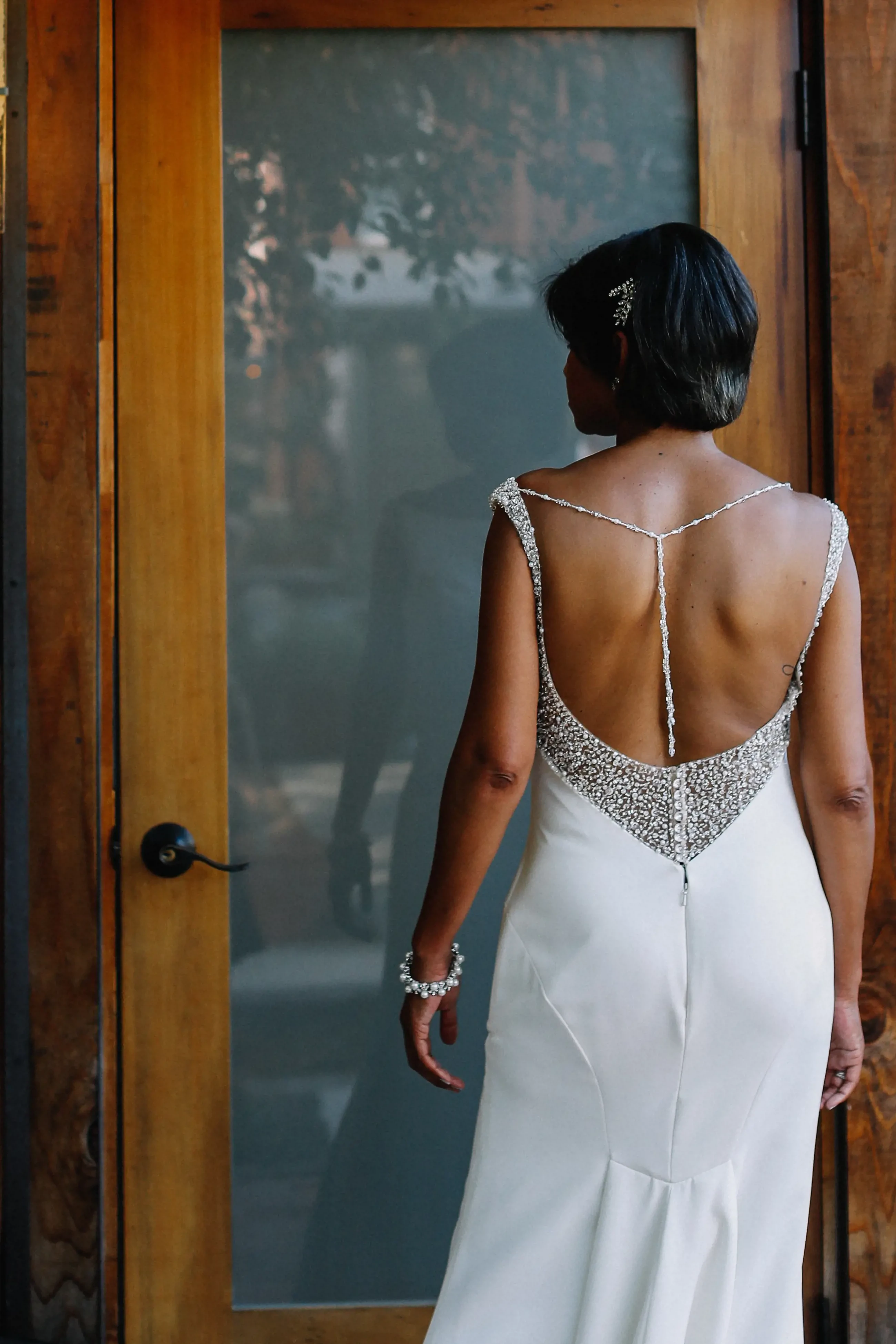 Model wearing a white gown